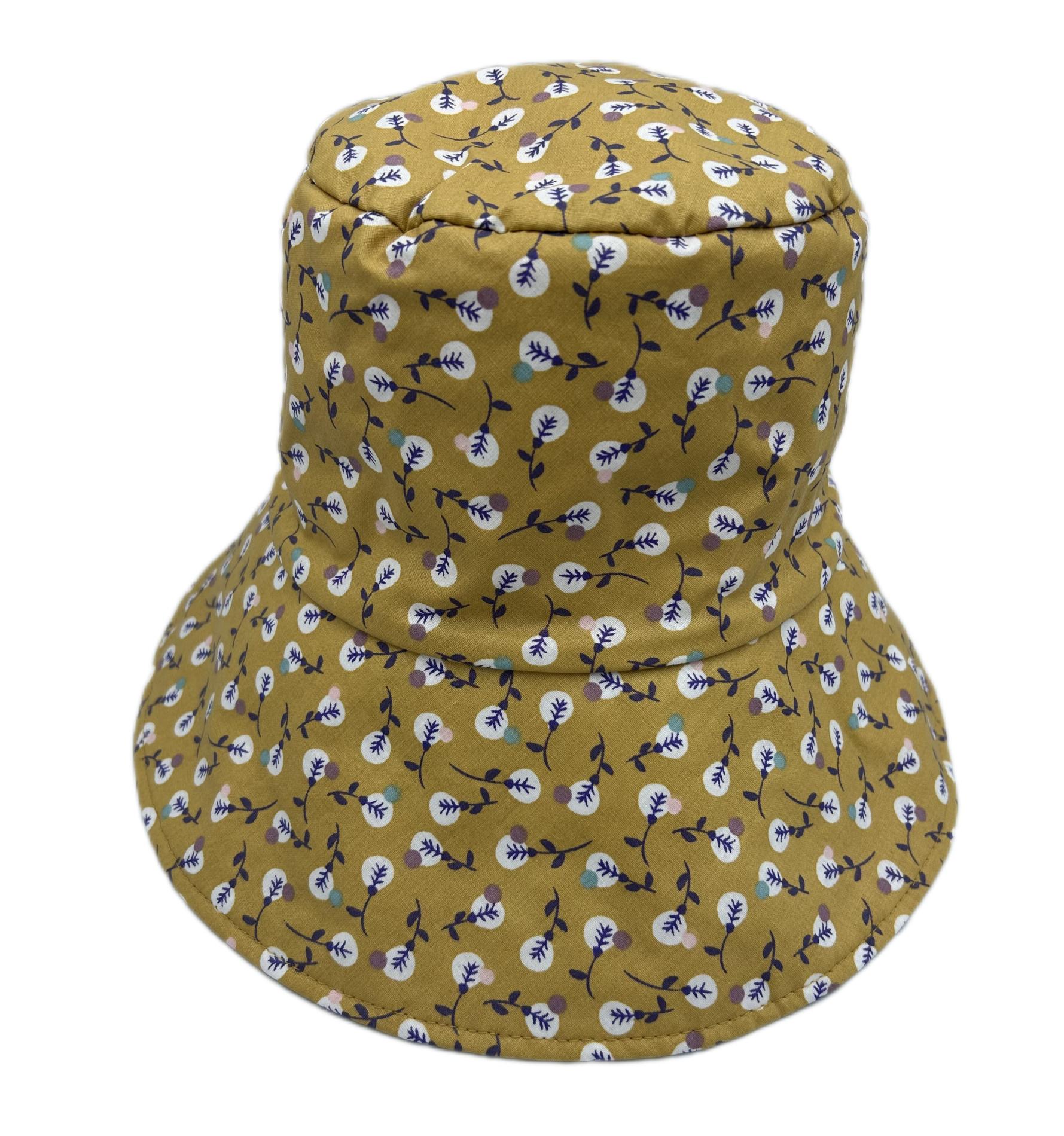 Chapeau de pluie moutarde