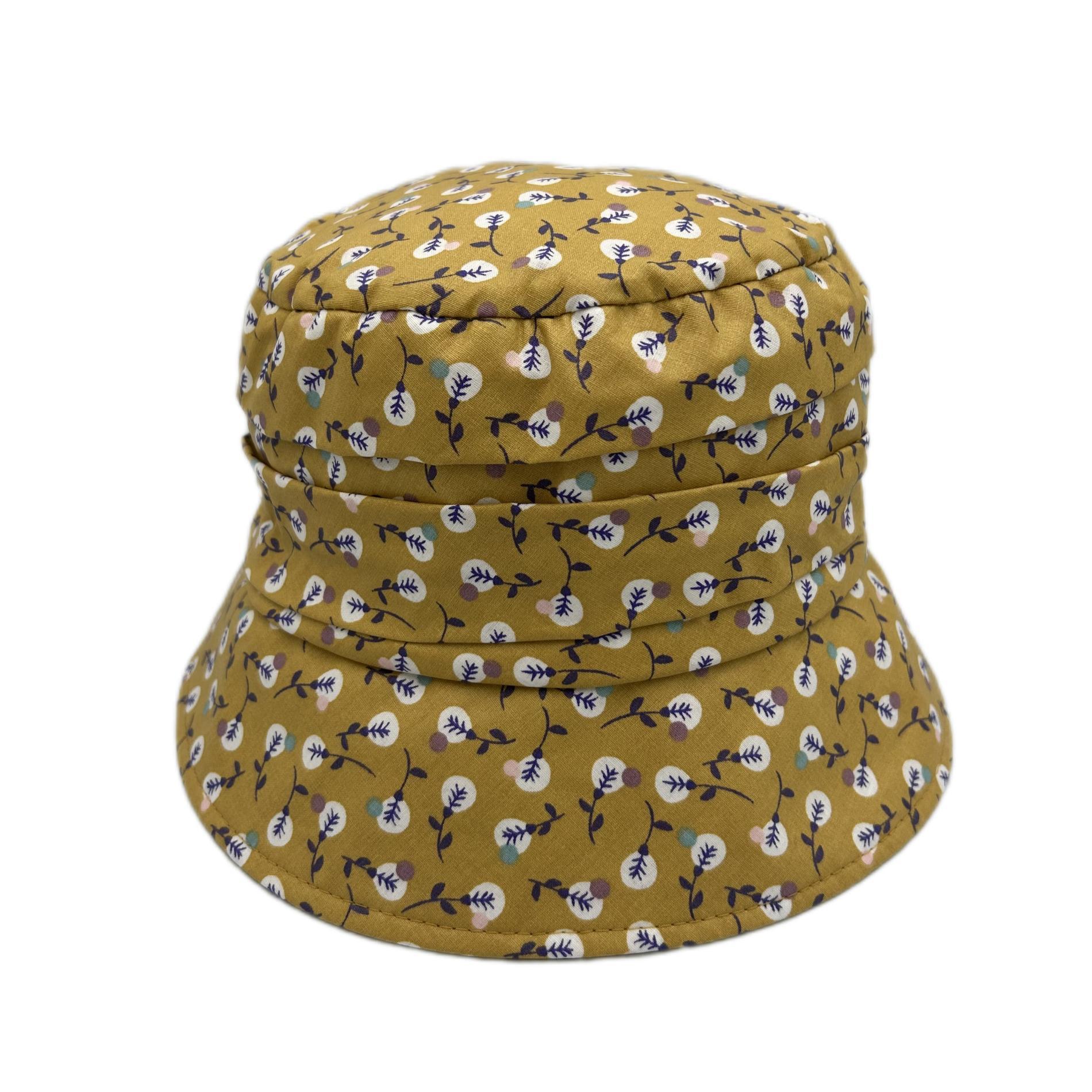 Chapeau de pluie moutarde