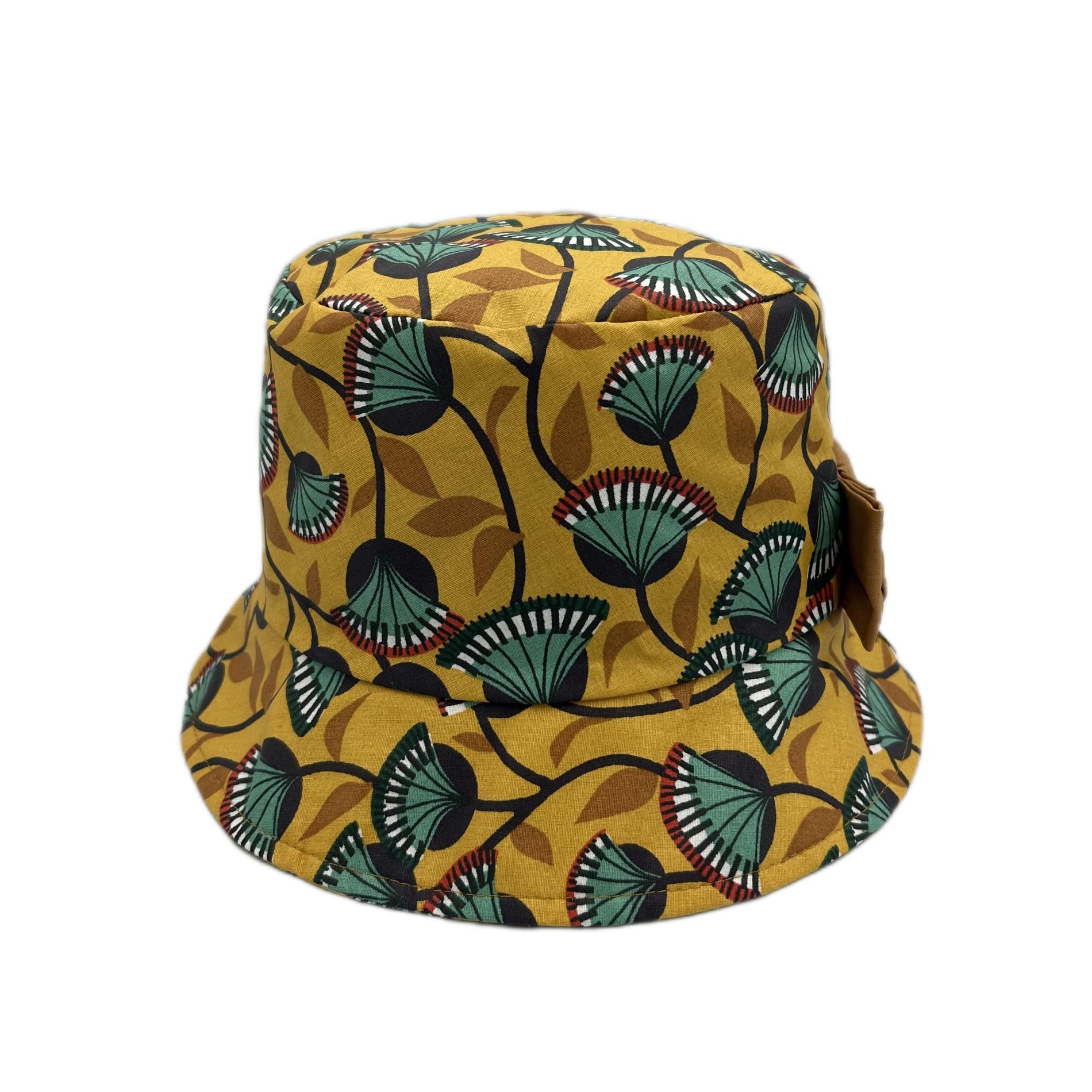 Chapeau de pluie moutarde à motif