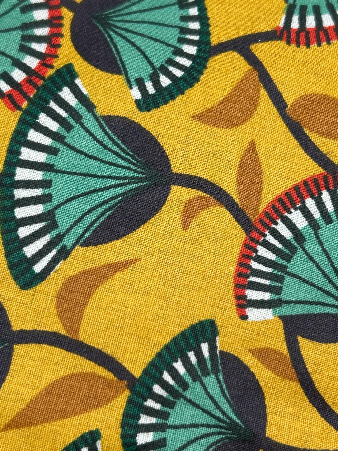 Chapeau de pluie moutarde à motif